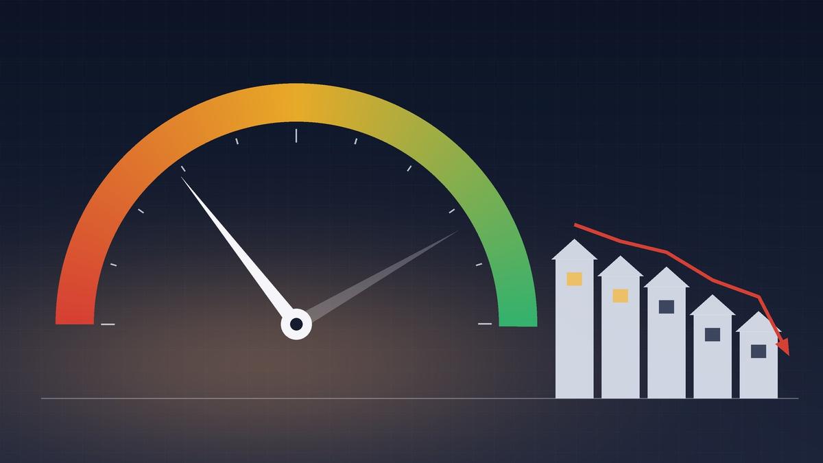 Illustration of a credit score gauge with its needle swinging low beside a row of houses under a falling trend line