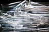 Clear glass measuring cylinders piled in a laboratory